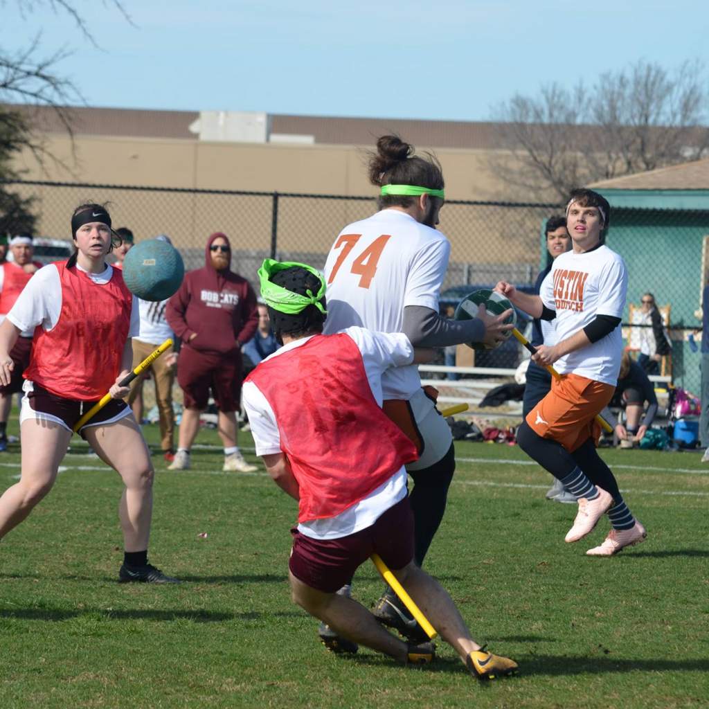 Quidditch player attempting to tackle an offensive player.