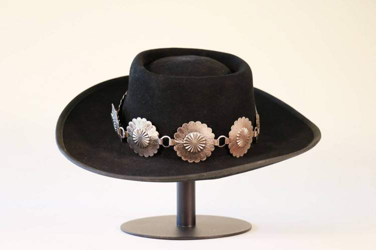 black hat with silver medallions