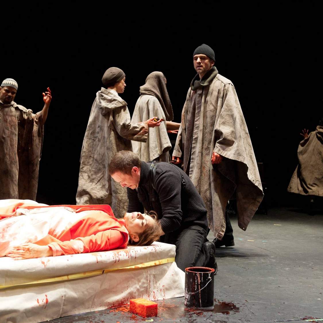 Mark Antony (Danforth Comins) remains behind with the murdered Caesar (Vilma Silva) as the conspirators exit to tell the people of their deed. Photo: Jenny Graham.