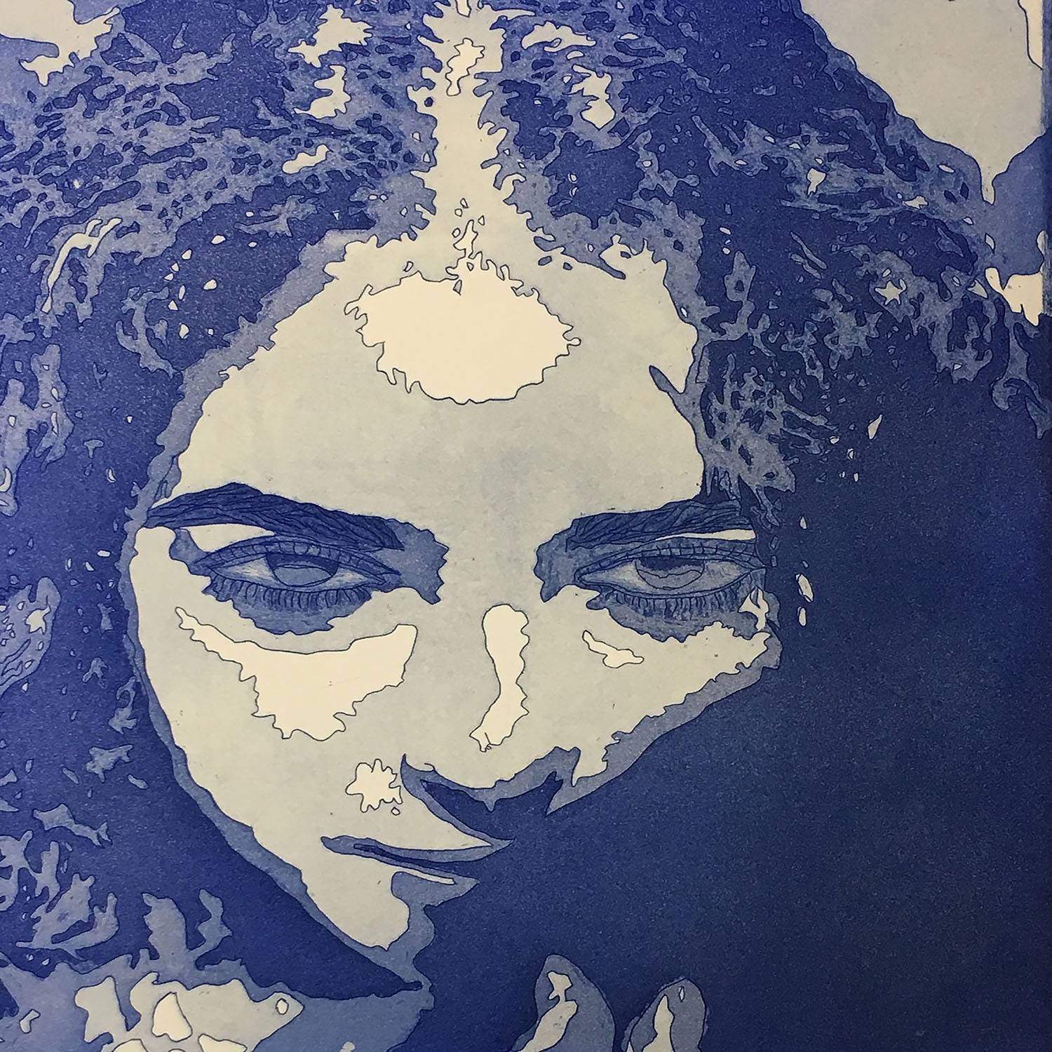 Student work: close-up of female face in gradations of blue