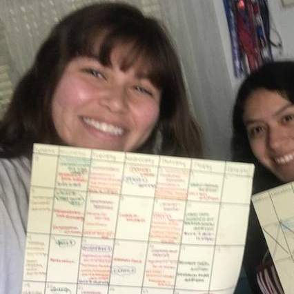 students holding calendars 