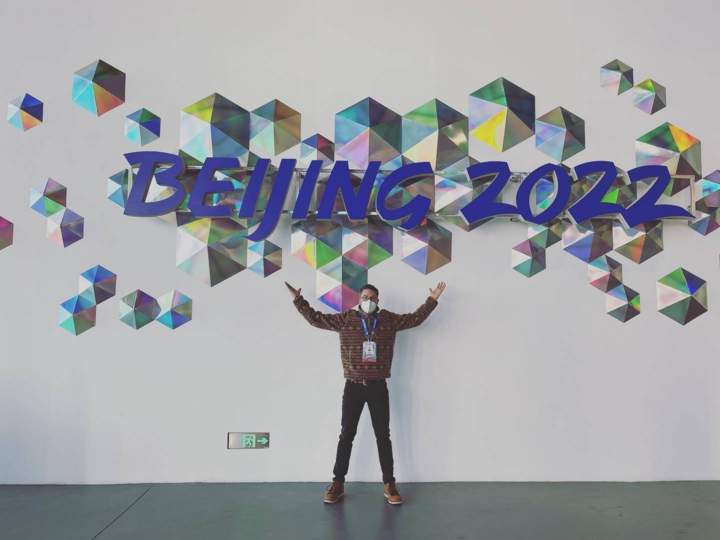 Michael Burns in front of 2022 olympics 