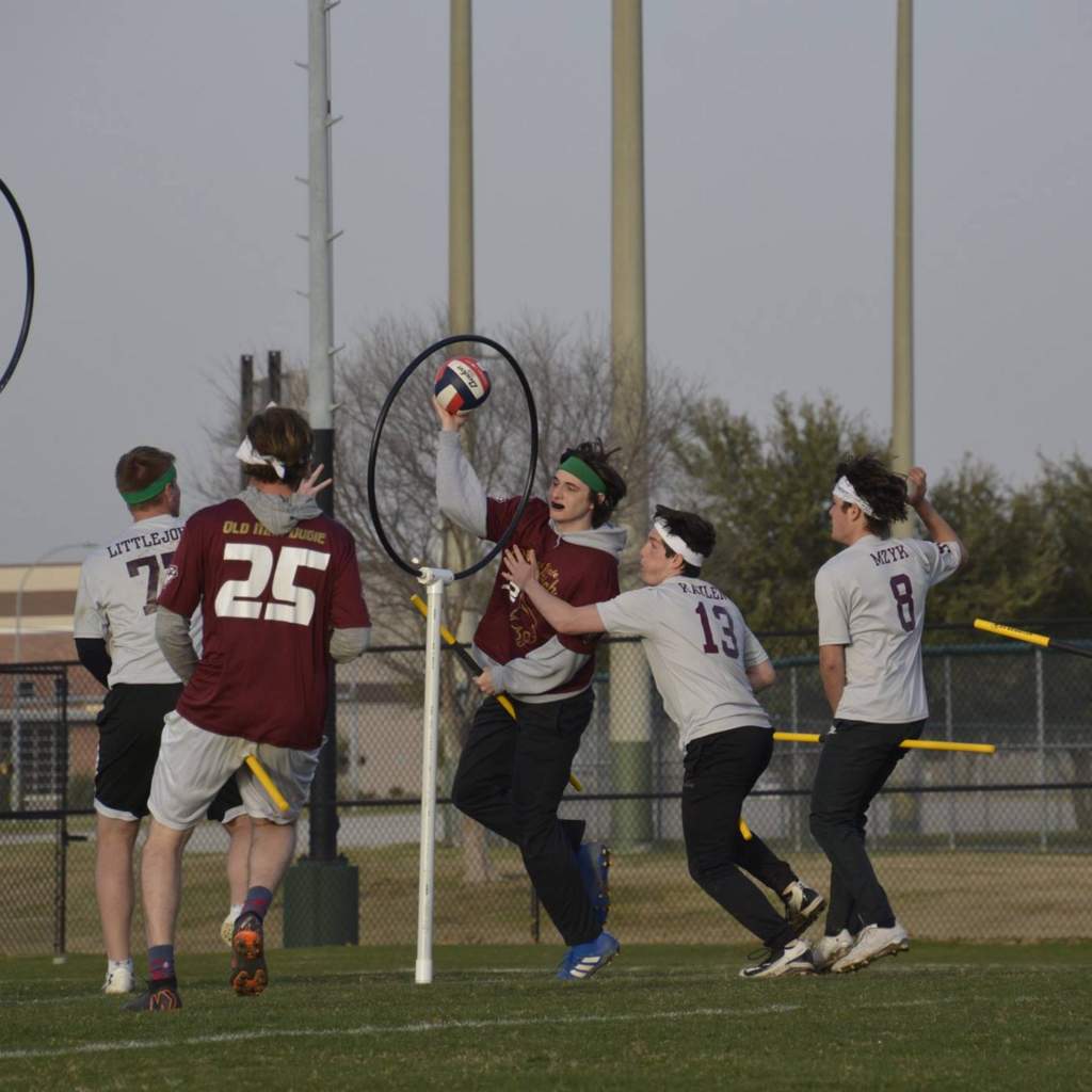Quidditch player attacking the hoop