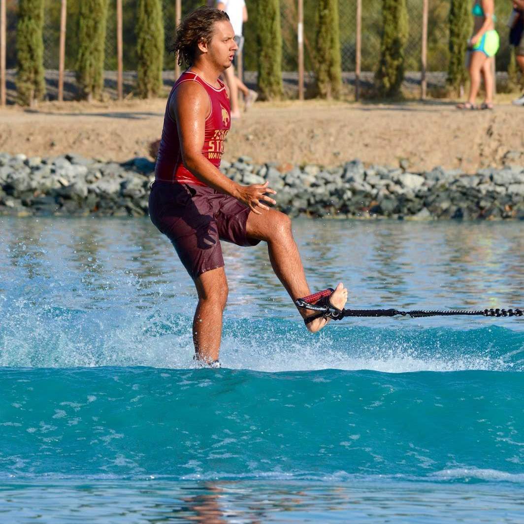 Water Ski player skiing behind boat 2
