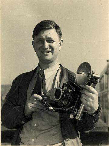 photo of man holding camera from russell lee collection