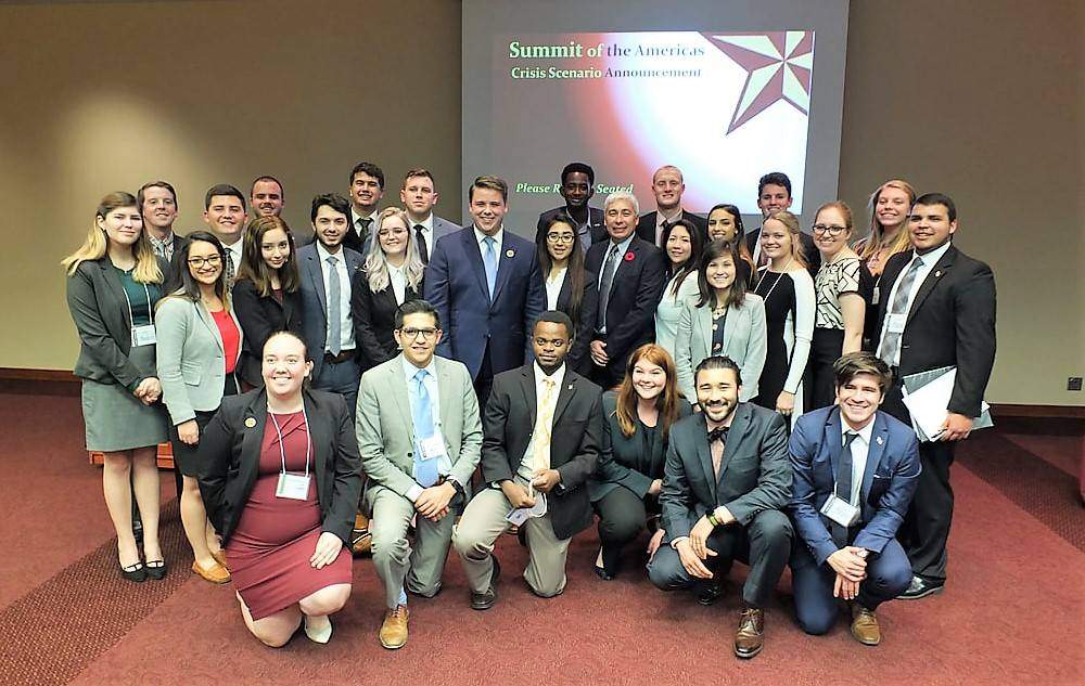 Guest Speaker Oliver del Cid, Belize's Ambassador to Mexico, with Texas State students.