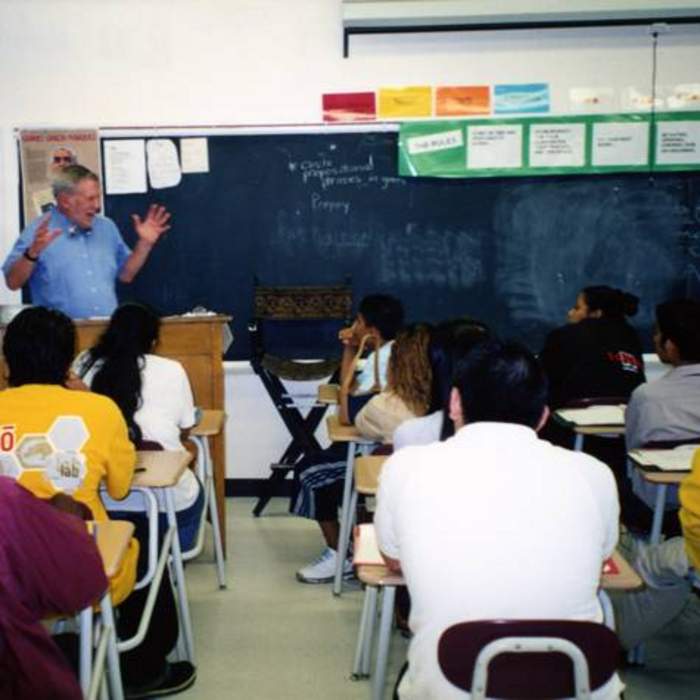 Bill Hobby teaching a high school class in conjunction with Teach for America