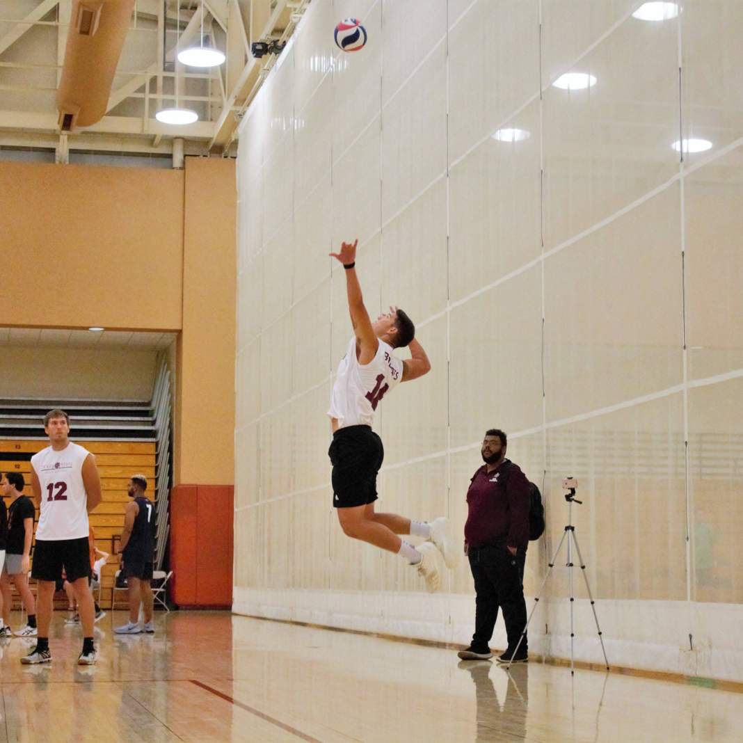 Men's Volleyball attempts a jump serve