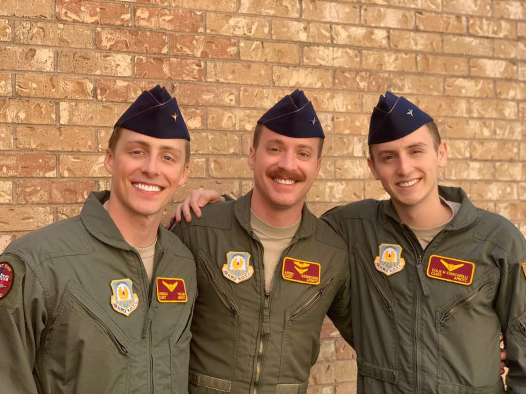 Three Bobcat Airmen Posing for Camera