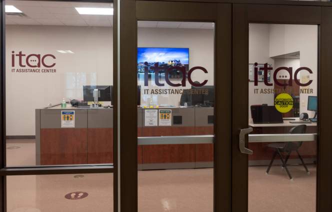 Glass doors to the the ITAC office.