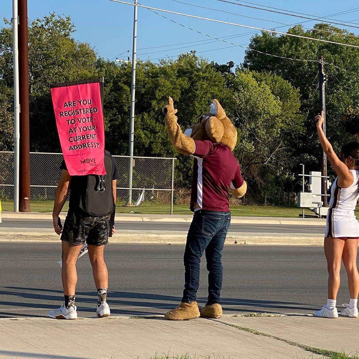 students holding signs