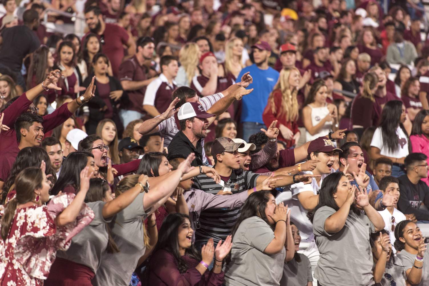 The loud crows cheering at a Texas State football game.