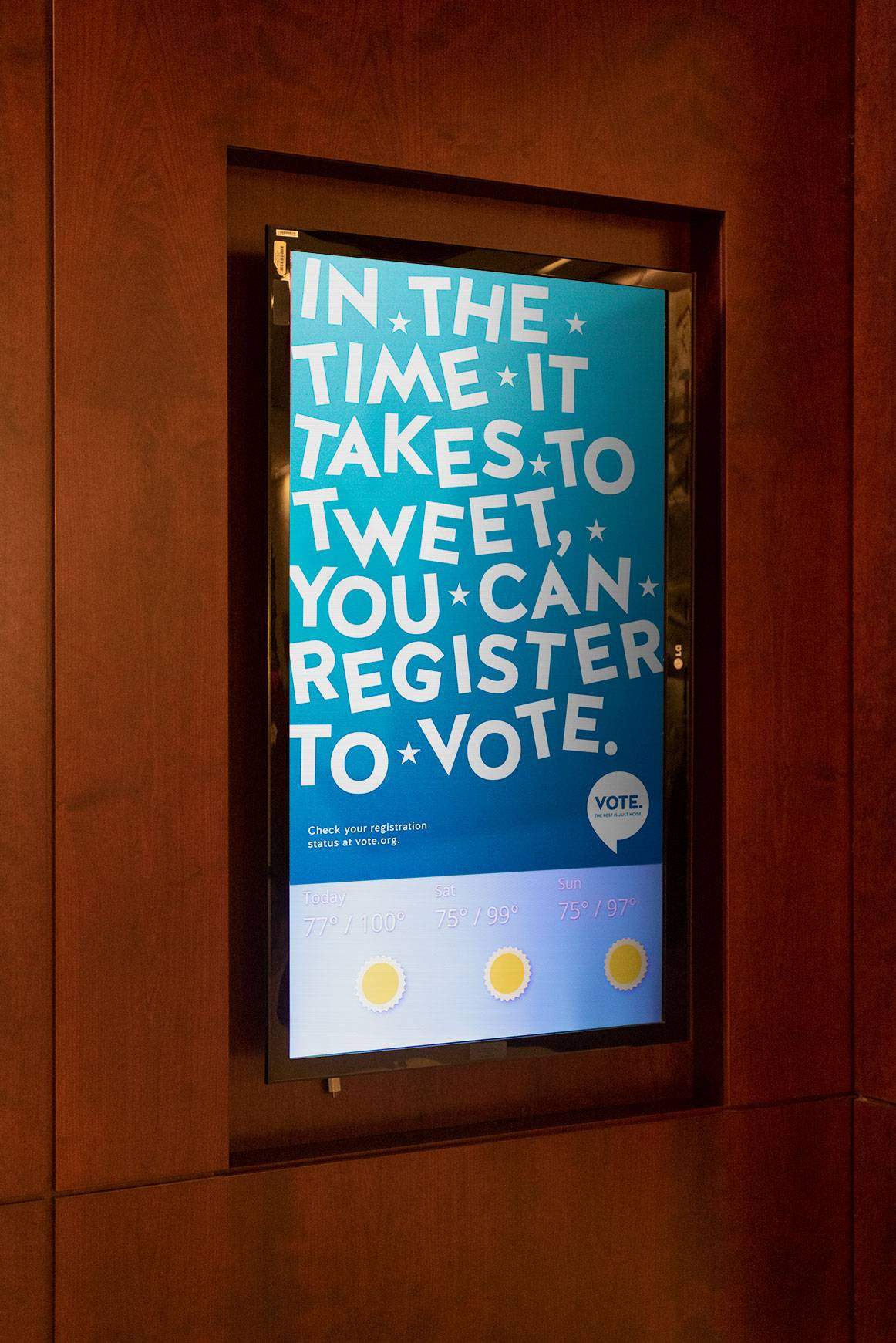 Vote campaign poster displayer on a digital sign.