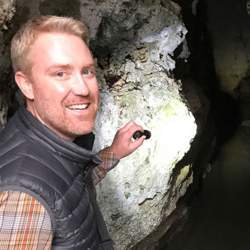 nick selfie in a cave