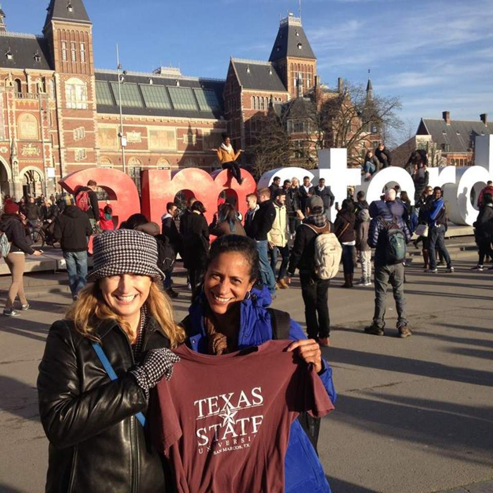 Grad student with Graduate College t-shirt in Amsterdam