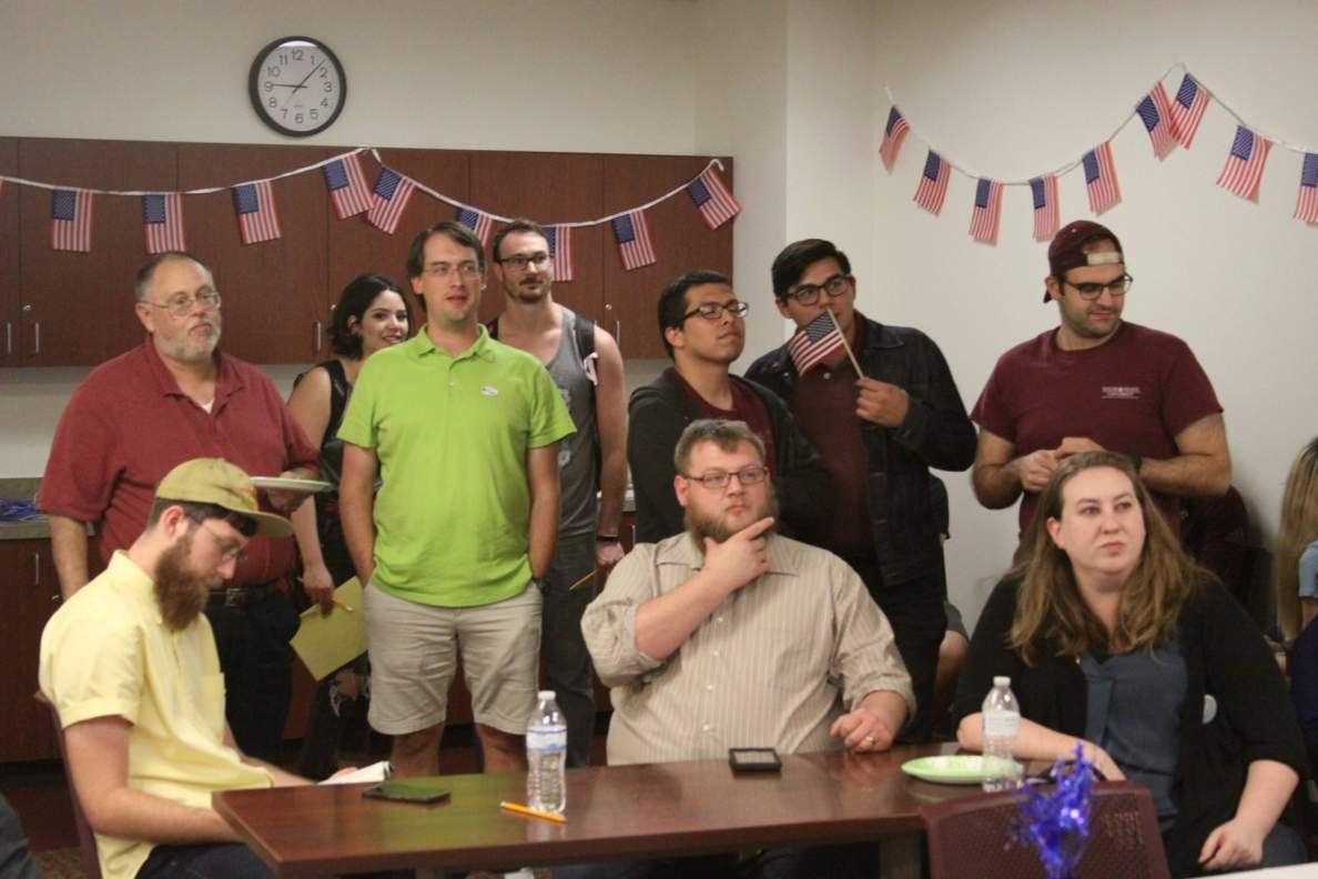 Faculty and Graduate Students watch the results roll in