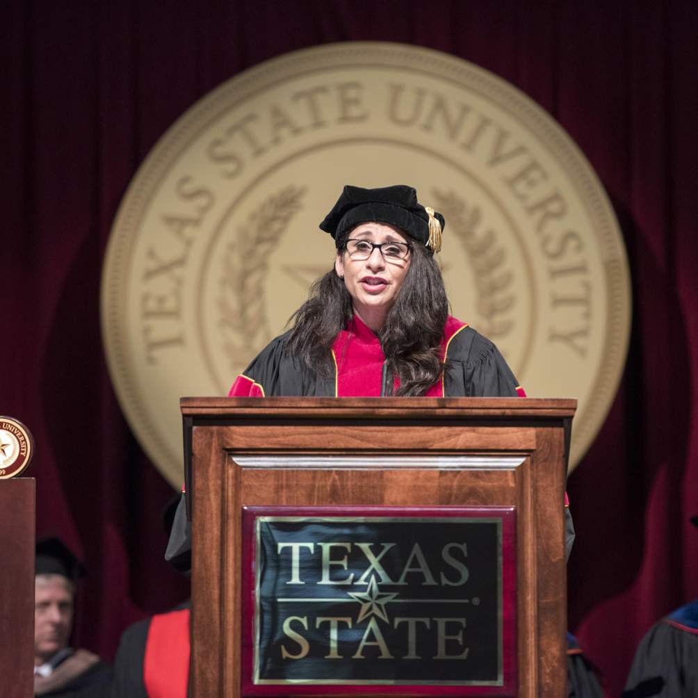 The Honorable Veronica Muzquiz Edwards, a member of the Texas State University System Board of Regents, addresses graduation candidates at a Summer 2016 commencement ceremony.