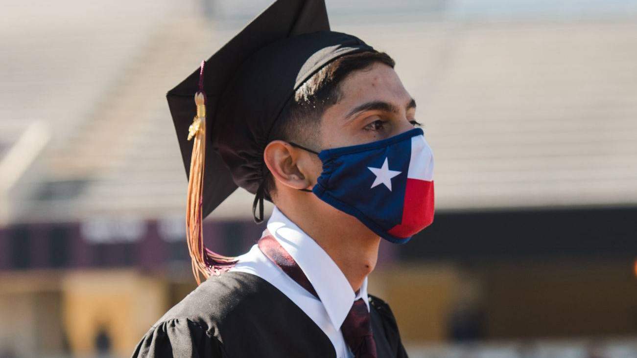 Student with Texas flag mask