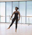 Black ballerina in dance studio