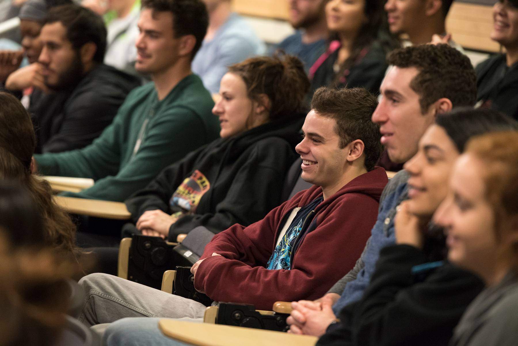 smiling students in the lecture hall