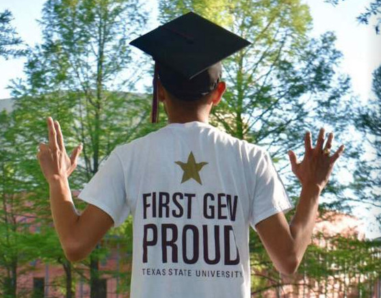 Male student wearing graduation cap and first gen t-shirt