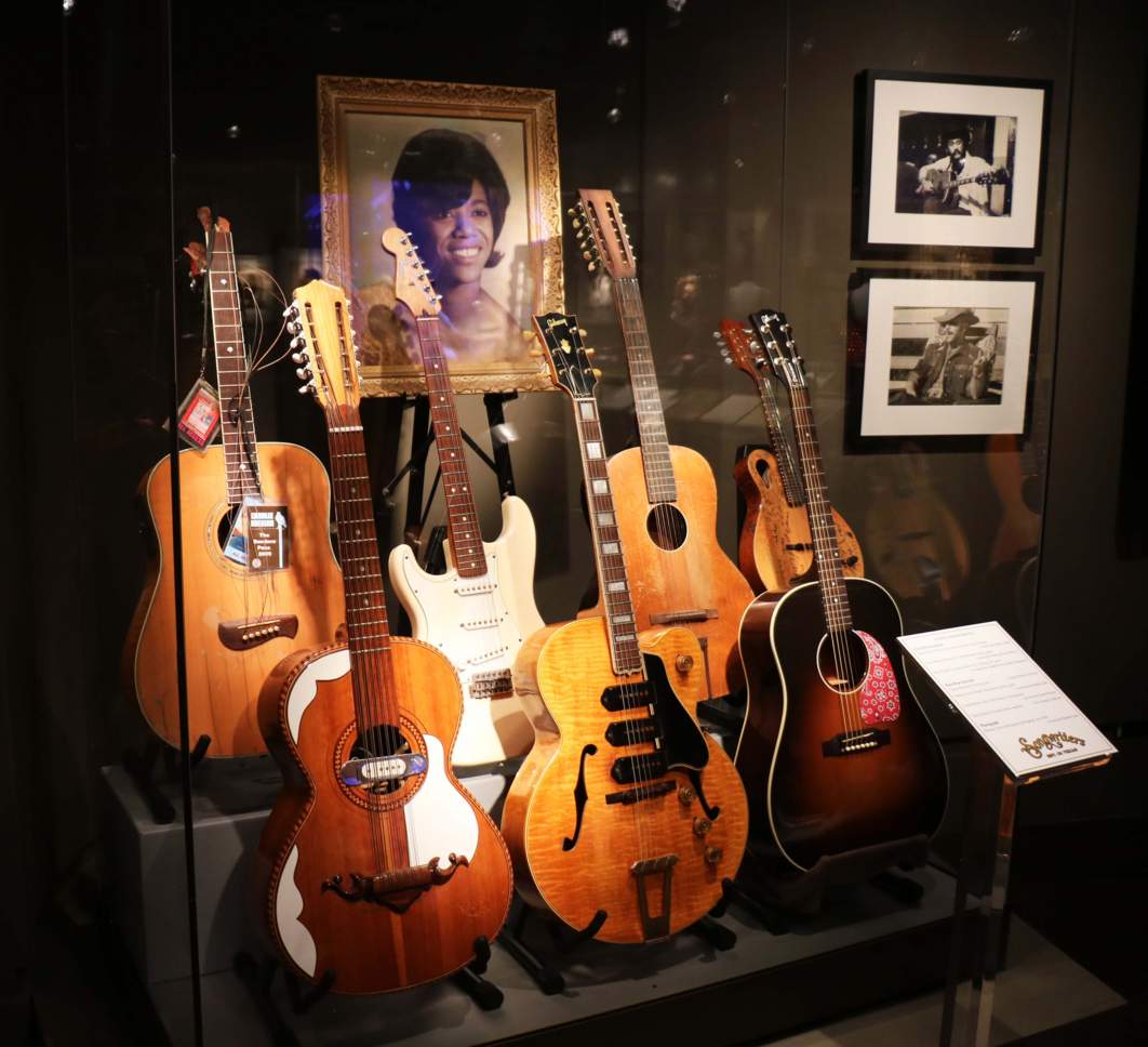 Photo of guitars on display