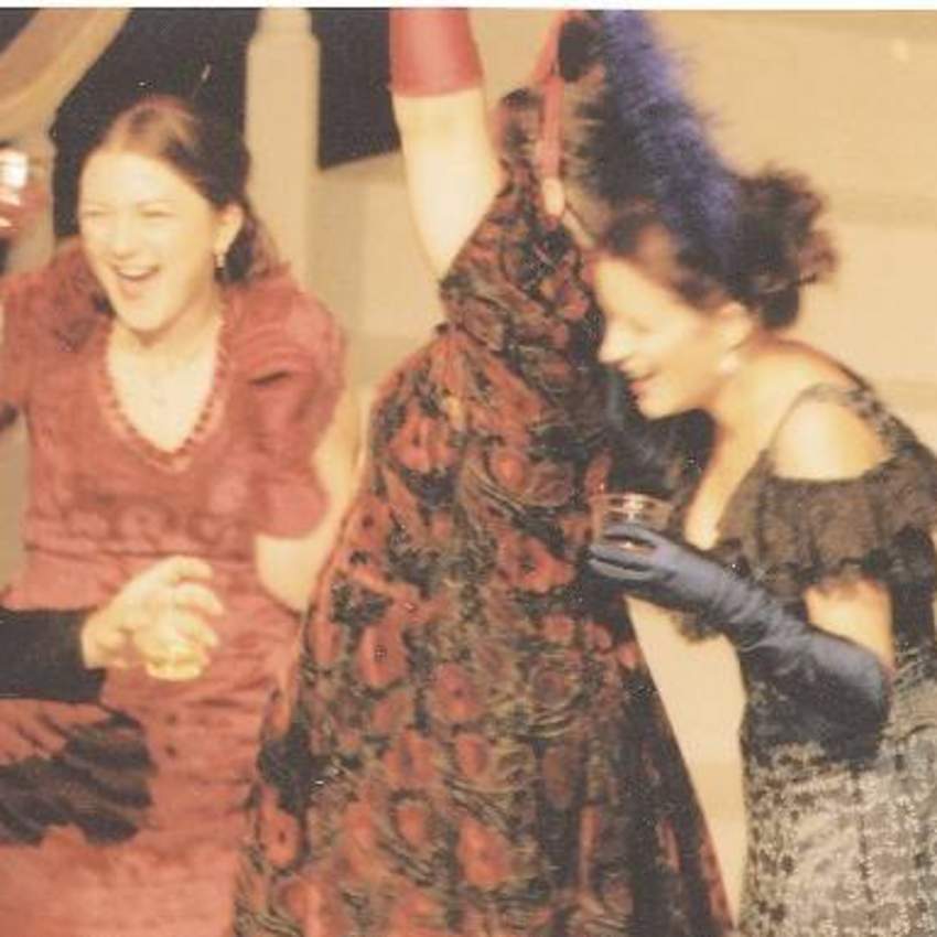Three laughing female characters