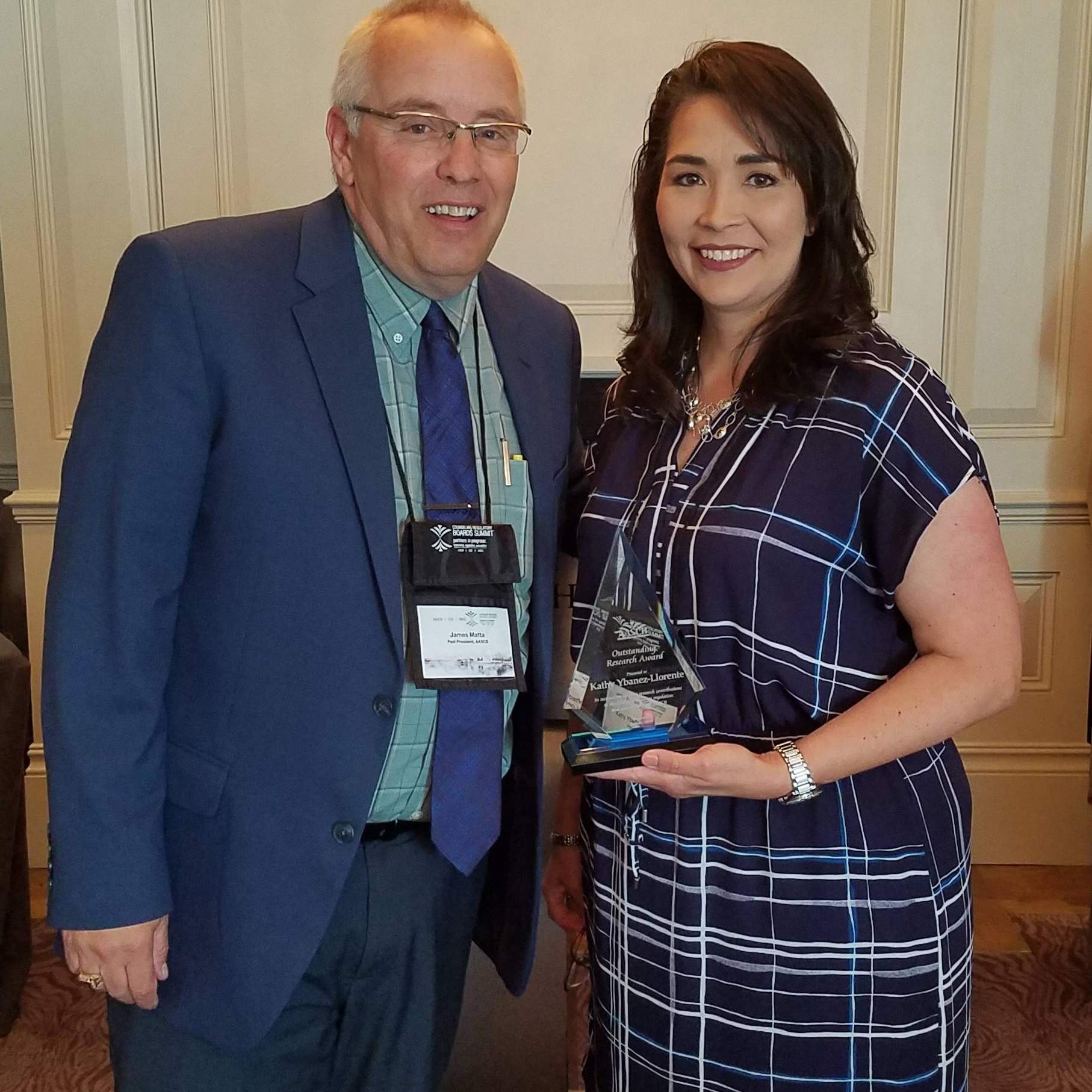 AASCB Outstanding Research Award August 2019 with Dr. James Matta
