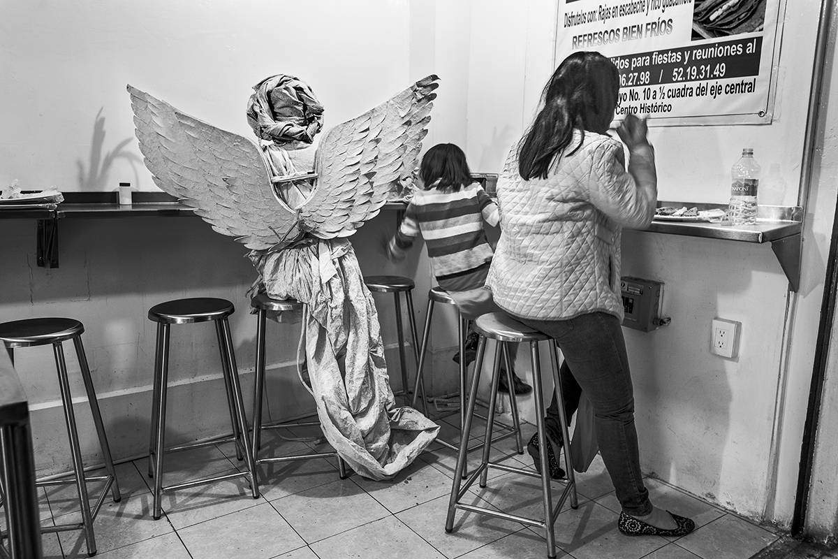 Angel at Lunch Counter, Historic Center, Mexico City, 2016 by Keith Dannemiller