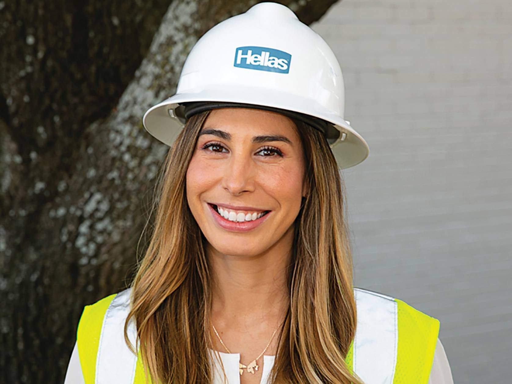 woman smiling in hard hat