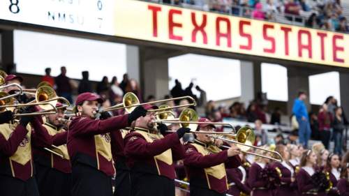 Texas State trombone band at stadium