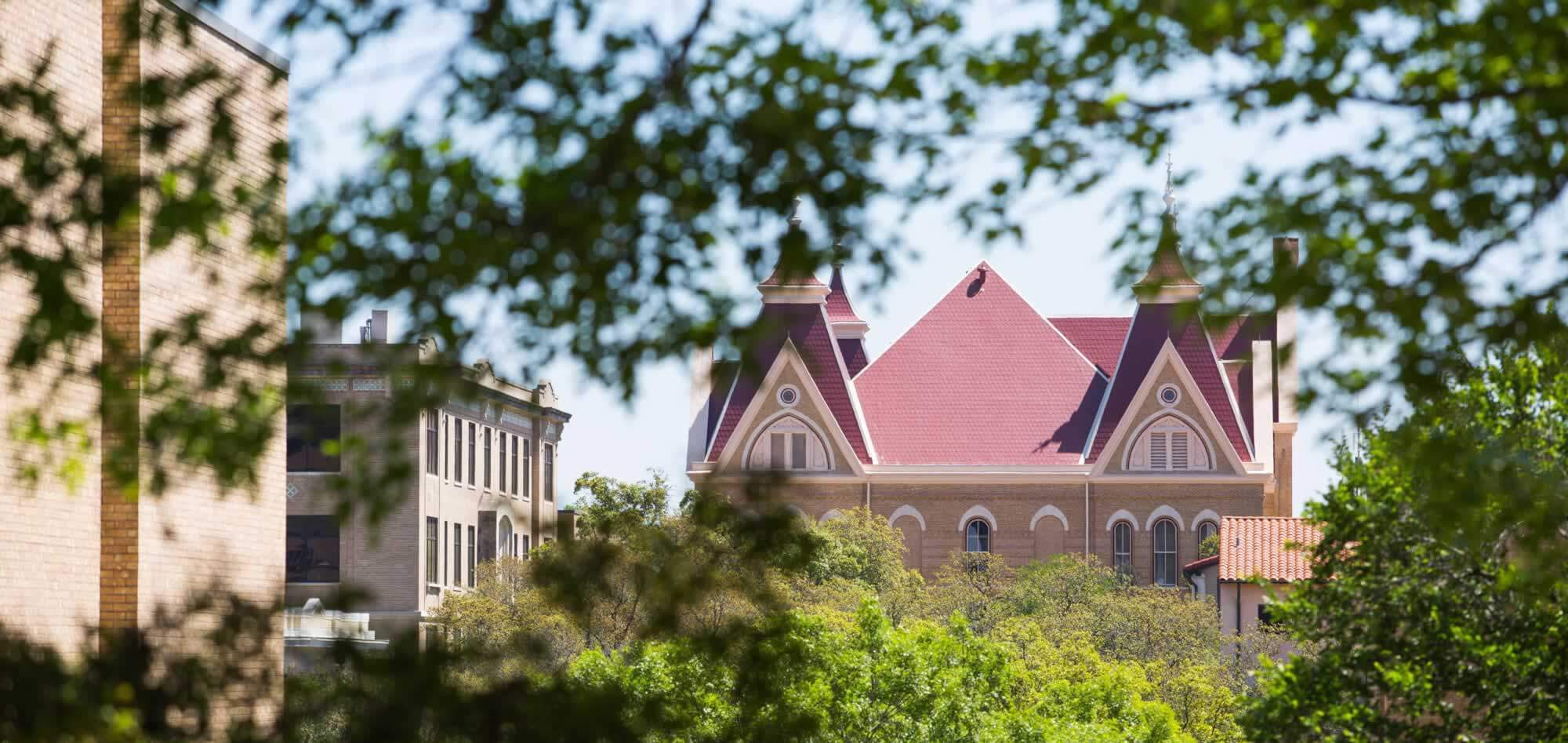 view of old main through trees