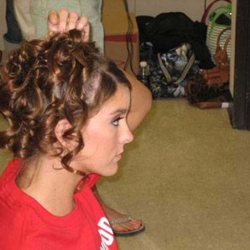 Model doing her hair before the FM Fashion Show 2006.