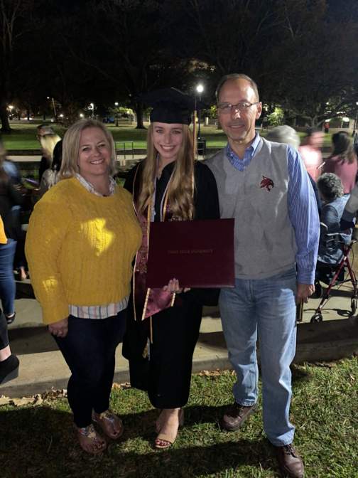 jones with parents after graduating