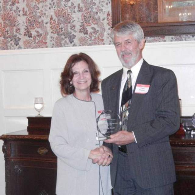 Ken Matwiczak presents Ms. Angela Evans, Clinical Professor in Public Policy Practice from LBJ’s School of Public Affairs with the 2013 Public Administrator Educator of the Year Award for Centex ASPA.