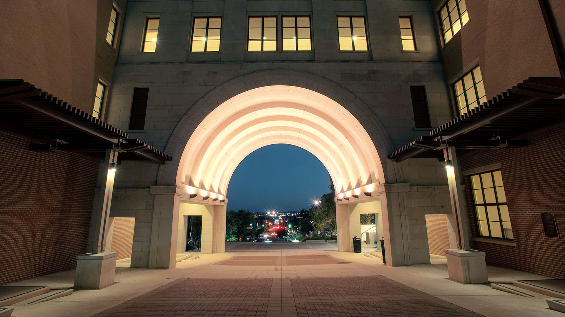 night view of the Undergraduate Academic Center lighted archway