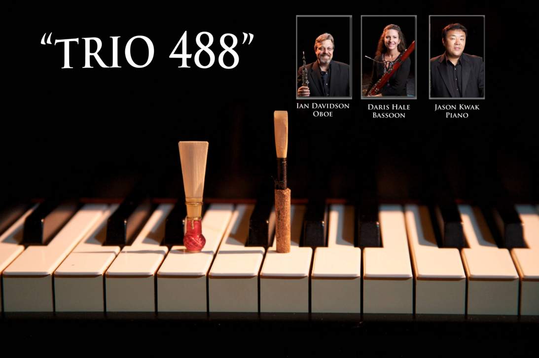 landscape photo of piano keys with oboe and bassoon reeds. Head shots of members superimposed in the top right corner.