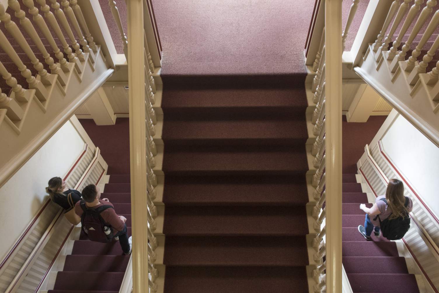 Maroon stairs in Old Main 
