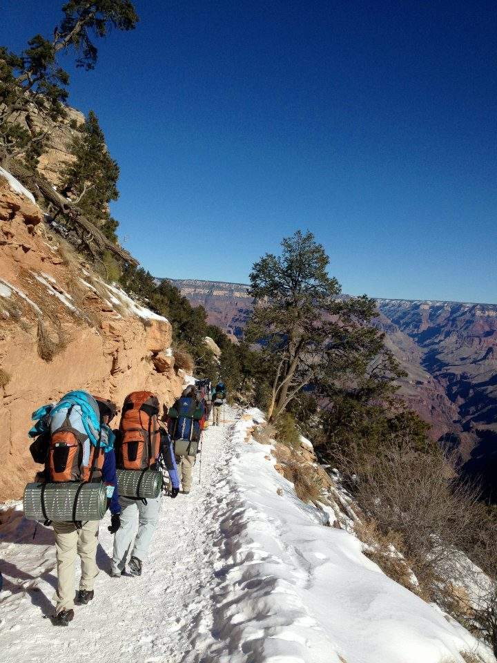 Students backpack in New Mexico on a snow covered ridge