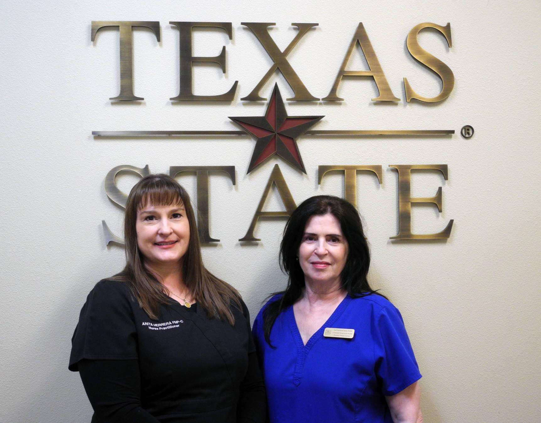 Image of the staff in the Round Rock Location, smiling.