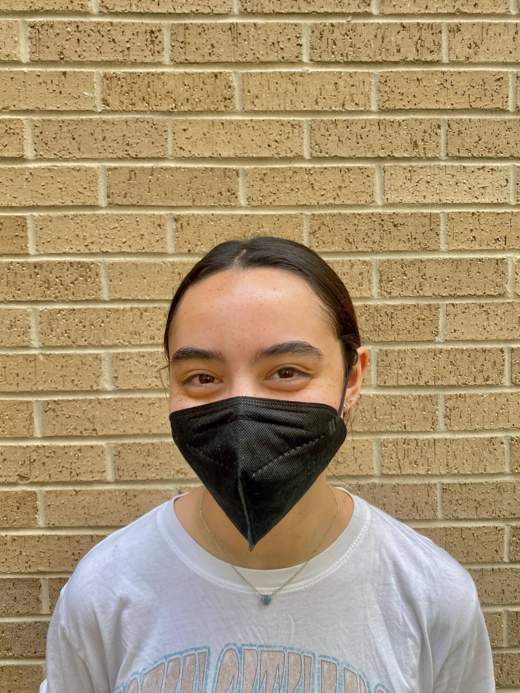 Texas State student wearing KN95 mask.