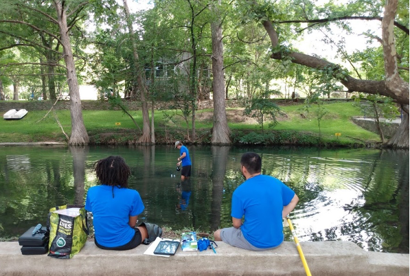 exas Stream Team staff, Desiree Jackson, Sandra Arismendez, and Daniel Vasquez sample the Lower Cypress Creek