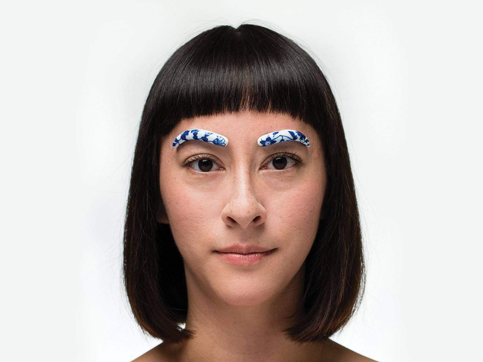 woman with porcelain piece eyebrows