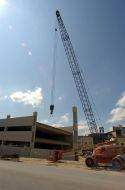 Picture of crane and other equipment working on a campus construction project