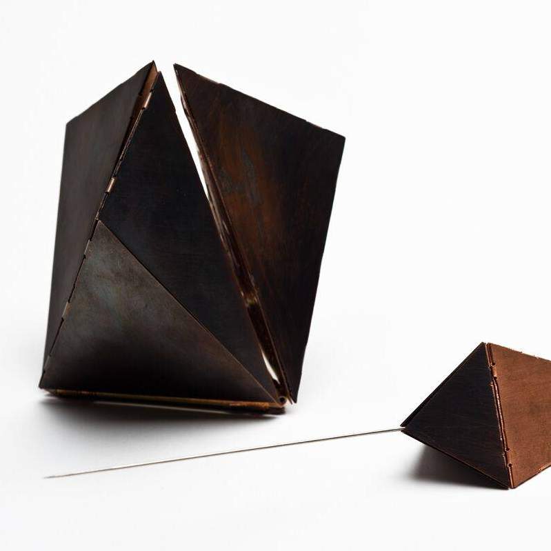 Student work: two facted metal geometric forms