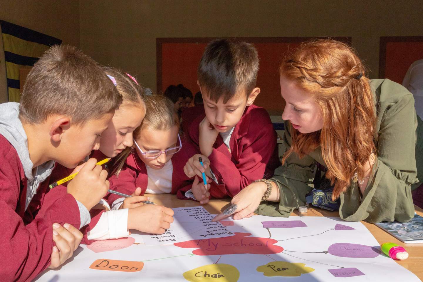Peace Corps Volunteer teaching children in Kosovo 