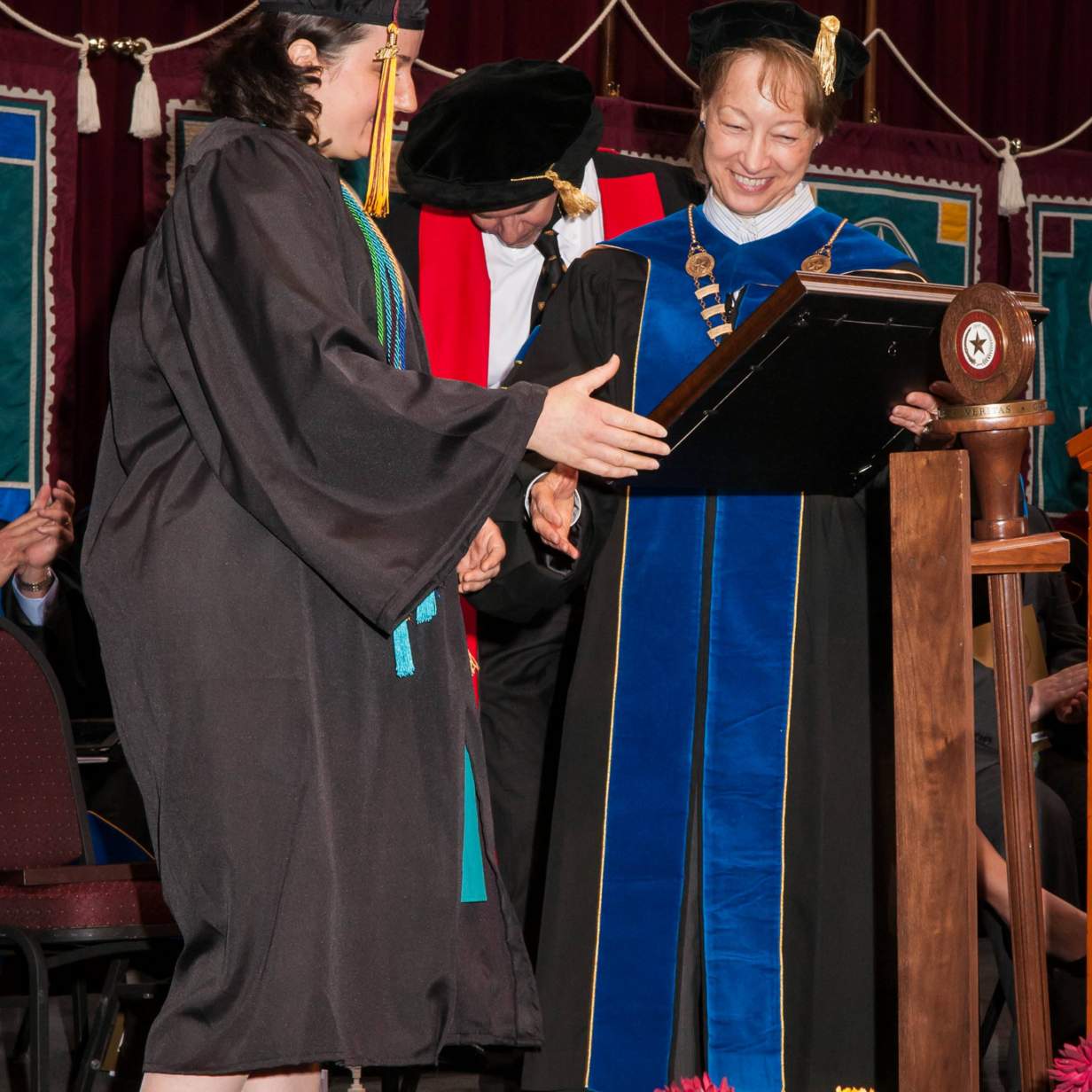 President Dr. Trauth presents degrees
