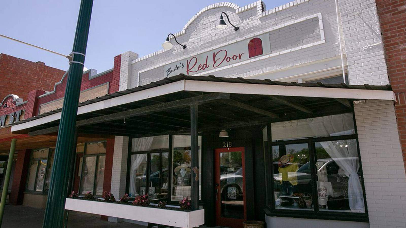 Front facade of The Red Door shop in Buda, Texas