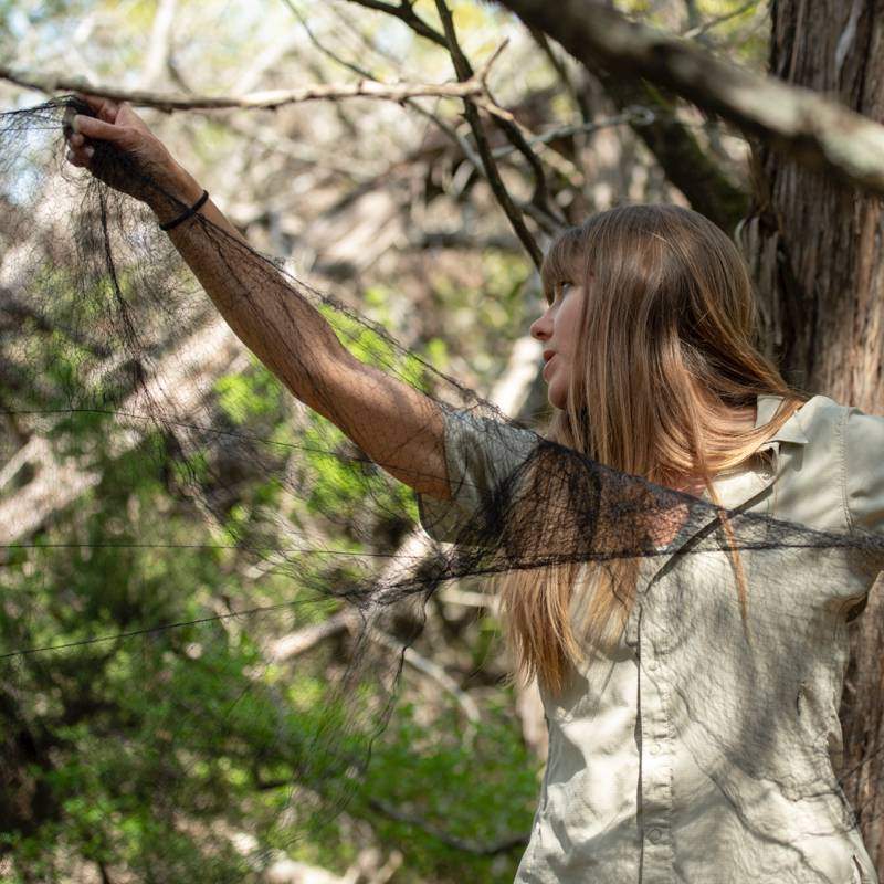 Rebekah Rylander stretching a net out