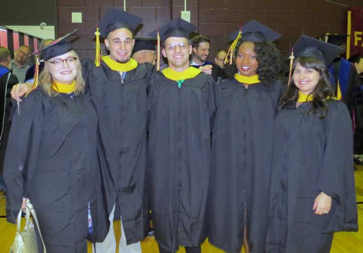 group of students at graduation in regalia